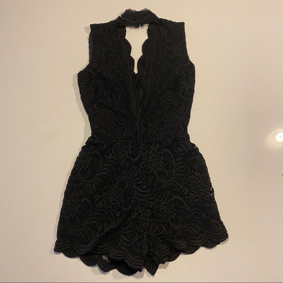 Black Lace Bebe Romper - Picture 4 of 6